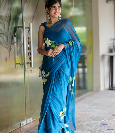 Nayantara Blue Chiffon Hand-Painted Saree – Frangipani Florals & Breezy Elegance
