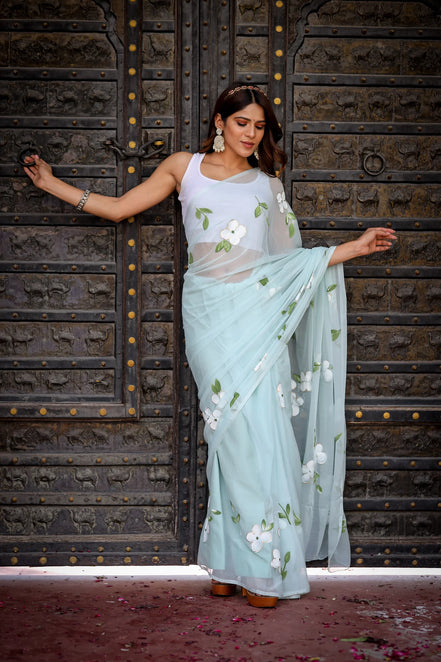 Ahalya Sky Blue Chiffon Hand-Painted Saree – Lotus Blooms & Ethereal Elegance