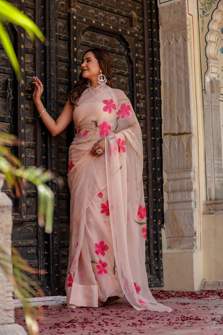 Iravya Peach Chiffon Saree – Hand-Painted Hibiscus Poetry