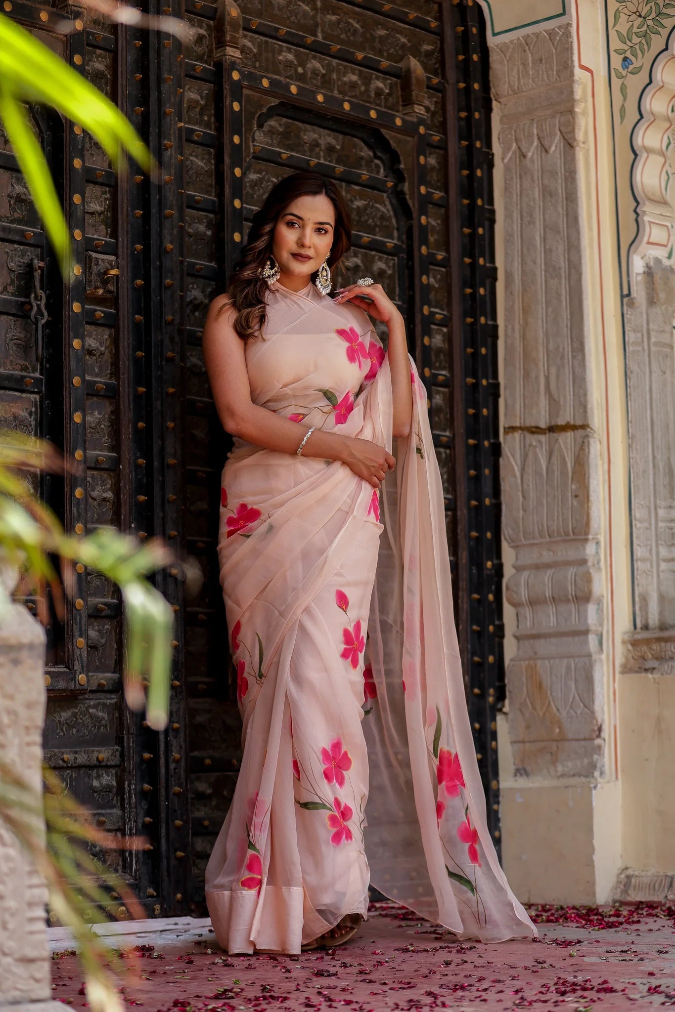 Iravya Peach Chiffon Saree – Hand-Painted Hibiscus Poetry