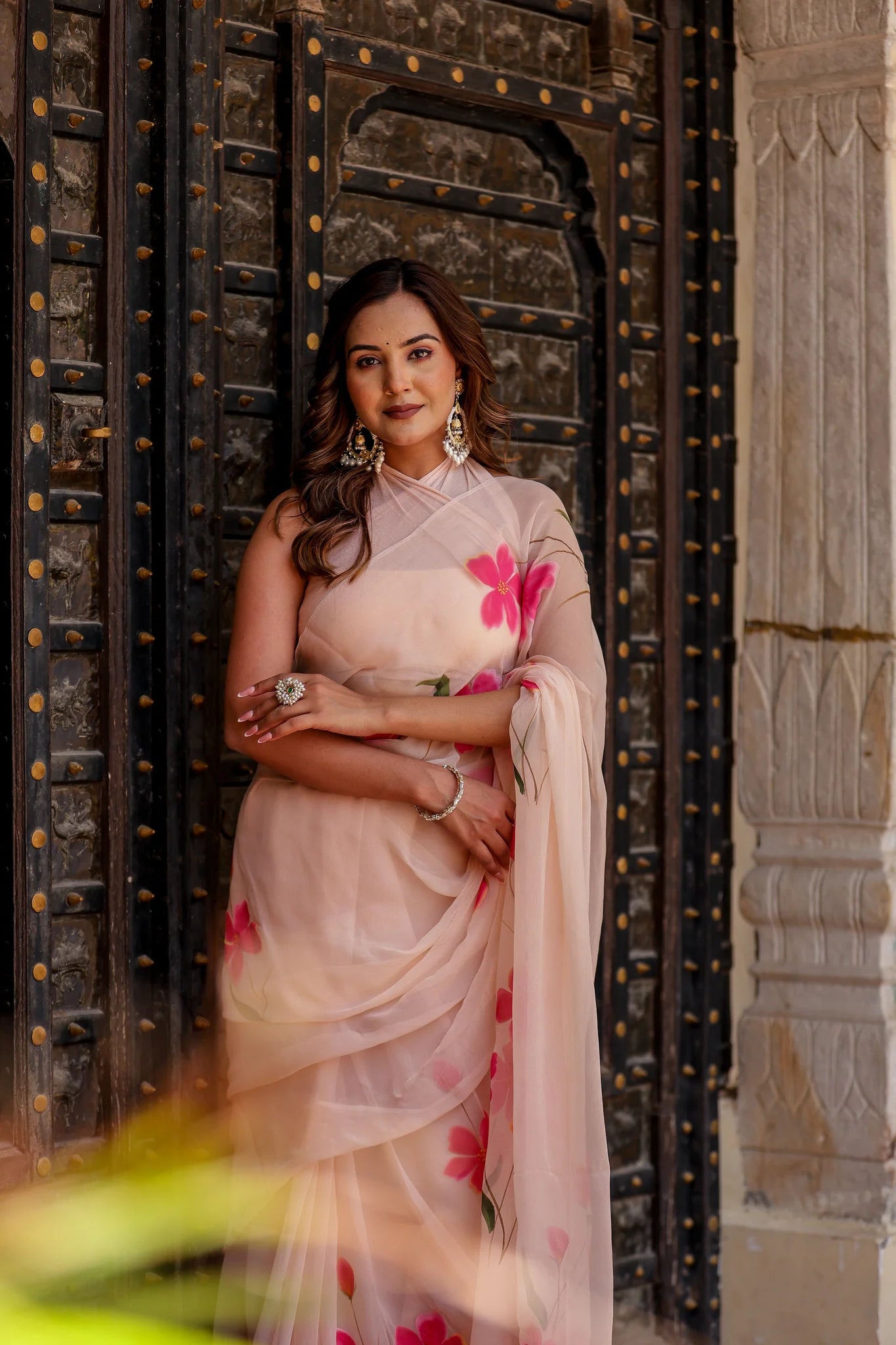 Iravya Peach Chiffon Saree – Hand-Painted Hibiscus Poetry