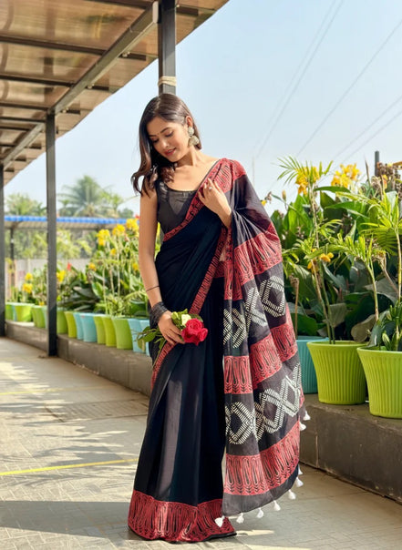 "Bhairavi" - Black Mulmul Cotton Saree with Red Border