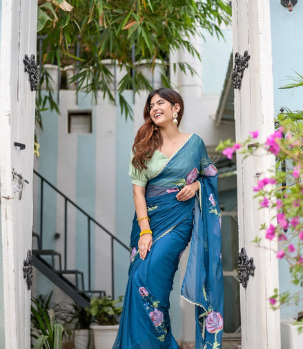Rajvika Teal Blue Chiffon Saree – Hand-Painted Rose Whisper