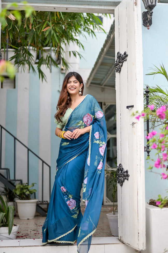 Rajvika Teal Blue Chiffon Saree – Hand-Painted Rose Whisper