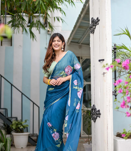 Rajvika Teal Blue Chiffon Saree – Hand-Painted Rose Whisper