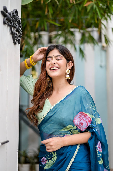 Rajvika Teal Blue Chiffon Saree – Hand-Painted Rose Whisper