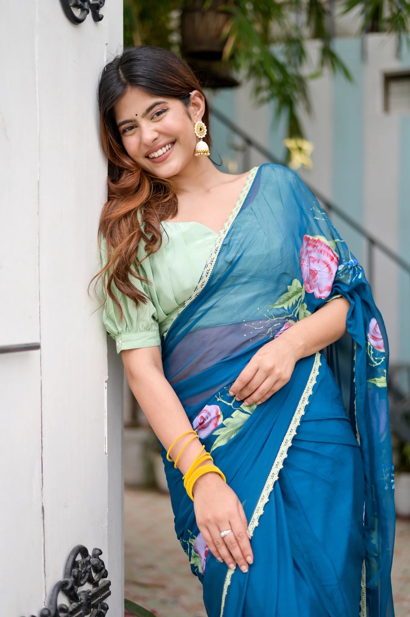 Rajvika Teal Blue Chiffon Saree – Hand-Painted Rose Whisper