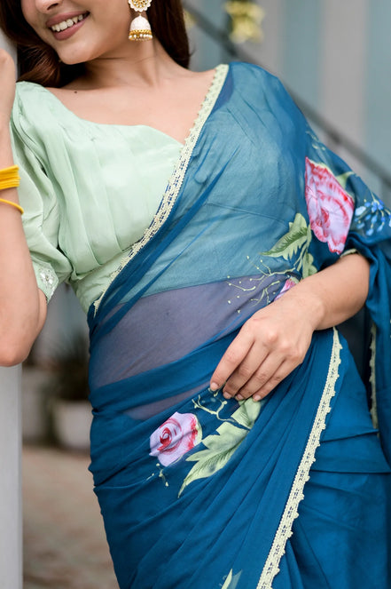 Rajvika Teal Blue Chiffon Saree – Hand-Painted Rose Whisper