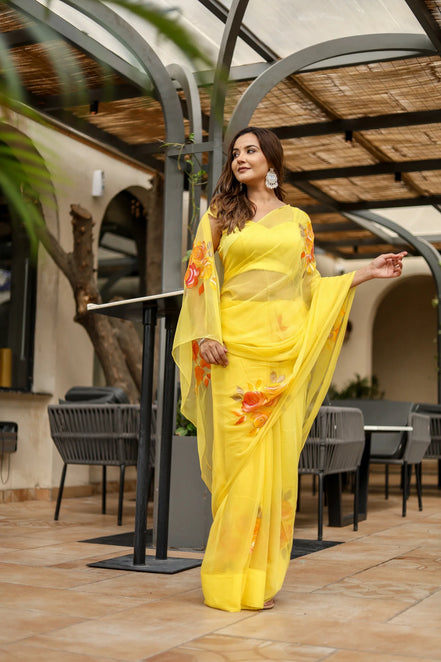Suvarnarekha Yellow Chiffon Saree – Hand-Painted Rose Radiance