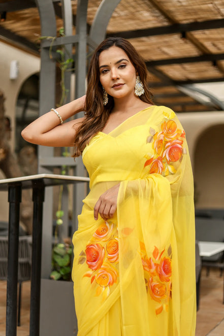 Suvarnarekha Yellow Chiffon Saree – Hand-Painted Rose Radiance