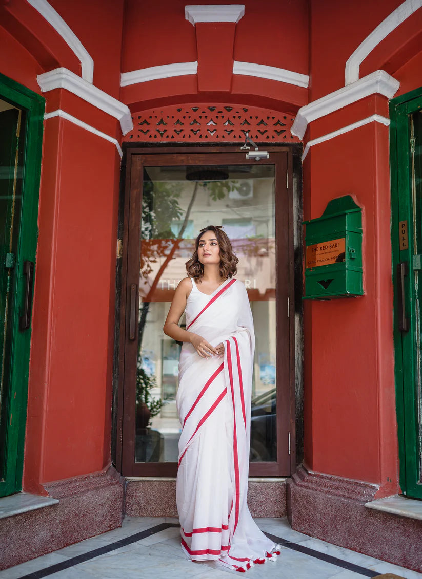 Ivory Charm White Mulmul Cotton Saree with Red Border & Tassels