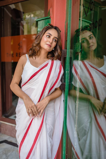 Ivory Charm White Mulmul Cotton Saree with Red Border & Tassels