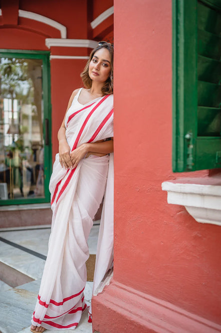 Ivory Charm White Mulmul Cotton Saree with Red Border & Tassels