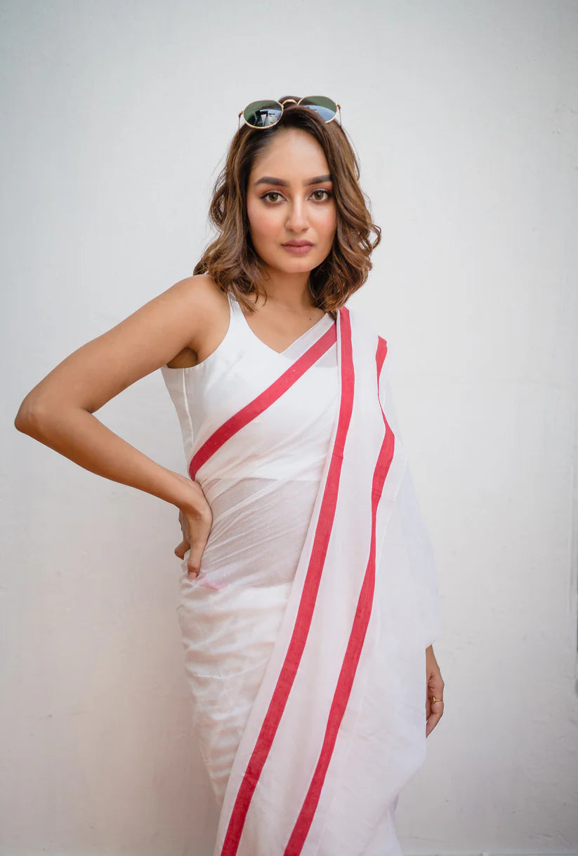 Ivory Charm White Mulmul Cotton Saree with Red Border & Tassels