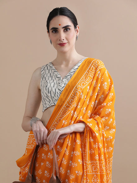 Kanika Orange Handblock Mulmul Cotton Saree – Radiant Florals in Lightweight Elegance