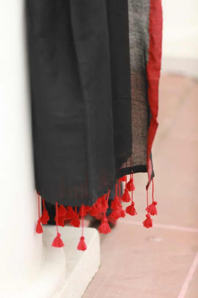 Noir Elegance Black Mulmul Cotton Saree with Red Tassels