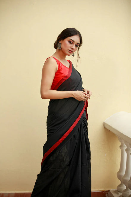 Noir Elegance Black Mulmul Cotton Saree with Red Tassels