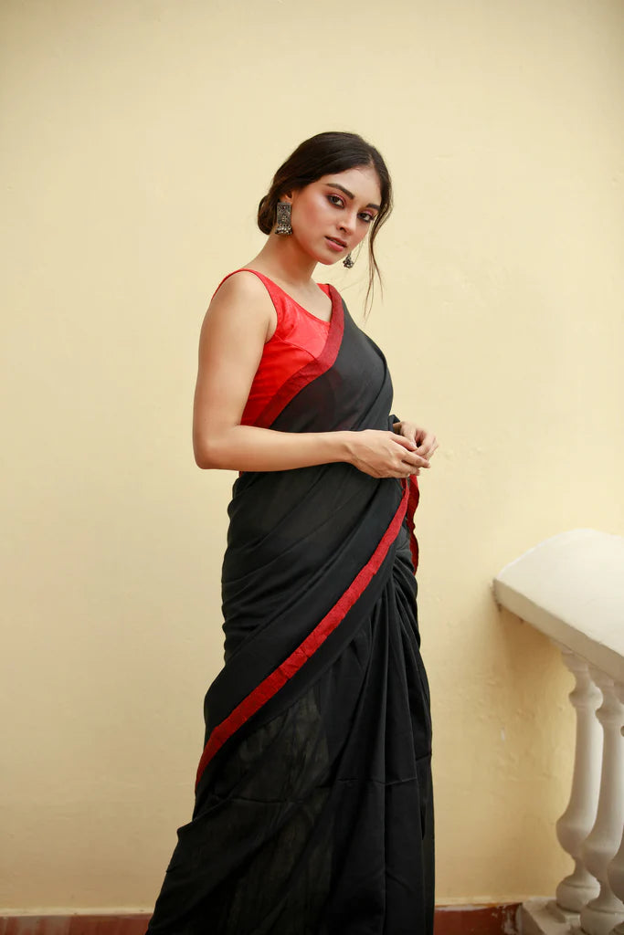 Noir Elegance Black Mulmul Cotton Saree with Red Tassels